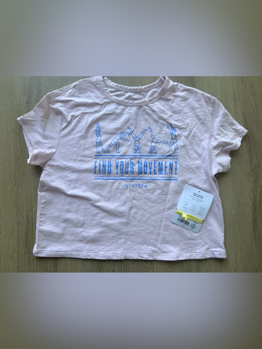 Athleta Kids Light Pink Tee with Blue 'Find Your Movement' Graphic